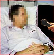 Anonymous heart attack victim being interviewed from hospital bed
