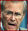 Donald Rumsfeld with tongue sticking out